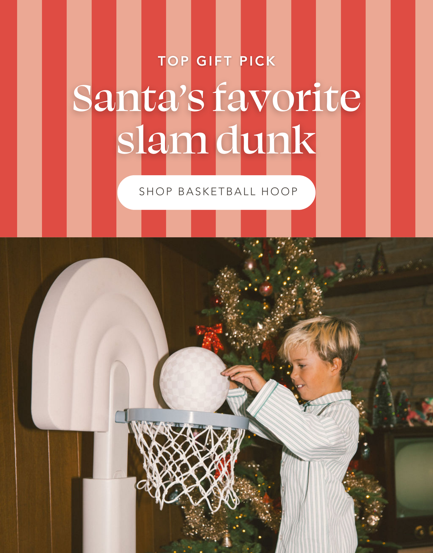 Kid slam dunking basketball into basketball hoop next to tree. Top Gift Pick: Santa's favorite slam dunk | Shop Hoop